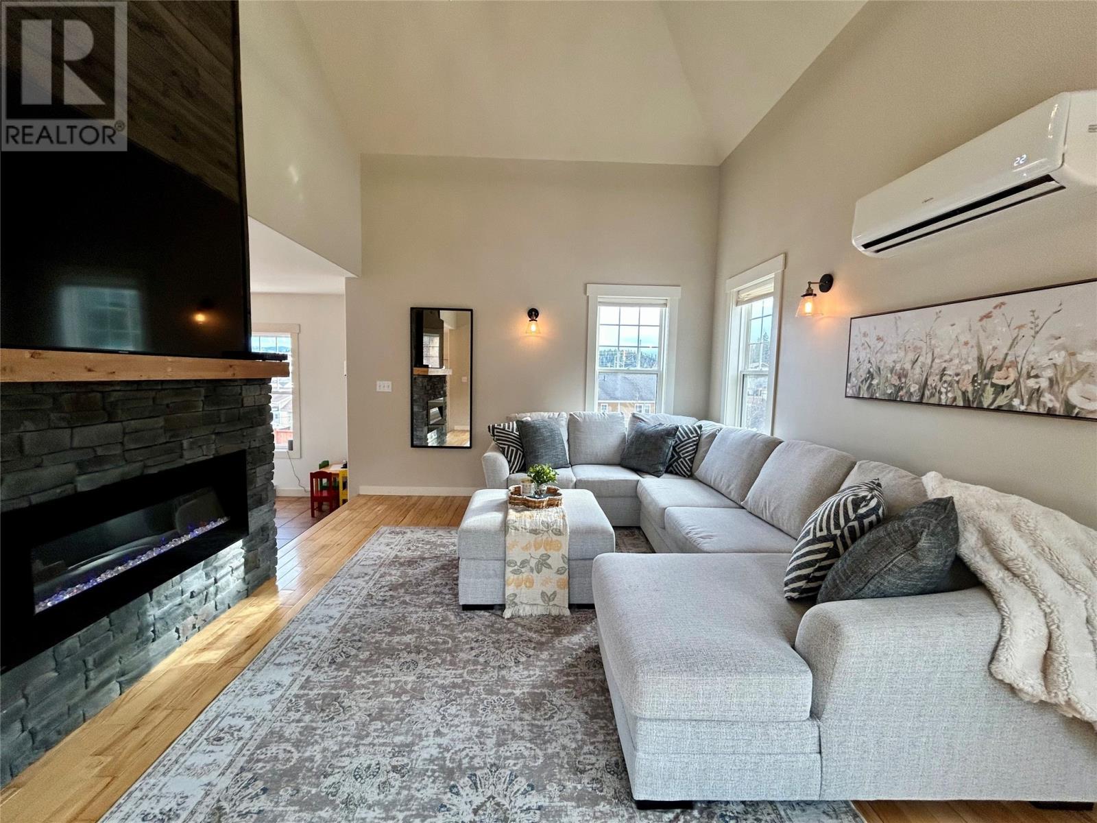 23 Hanlon Drive, Massey Drive, NL - Indoor Photo Showing Living Room With Fireplace