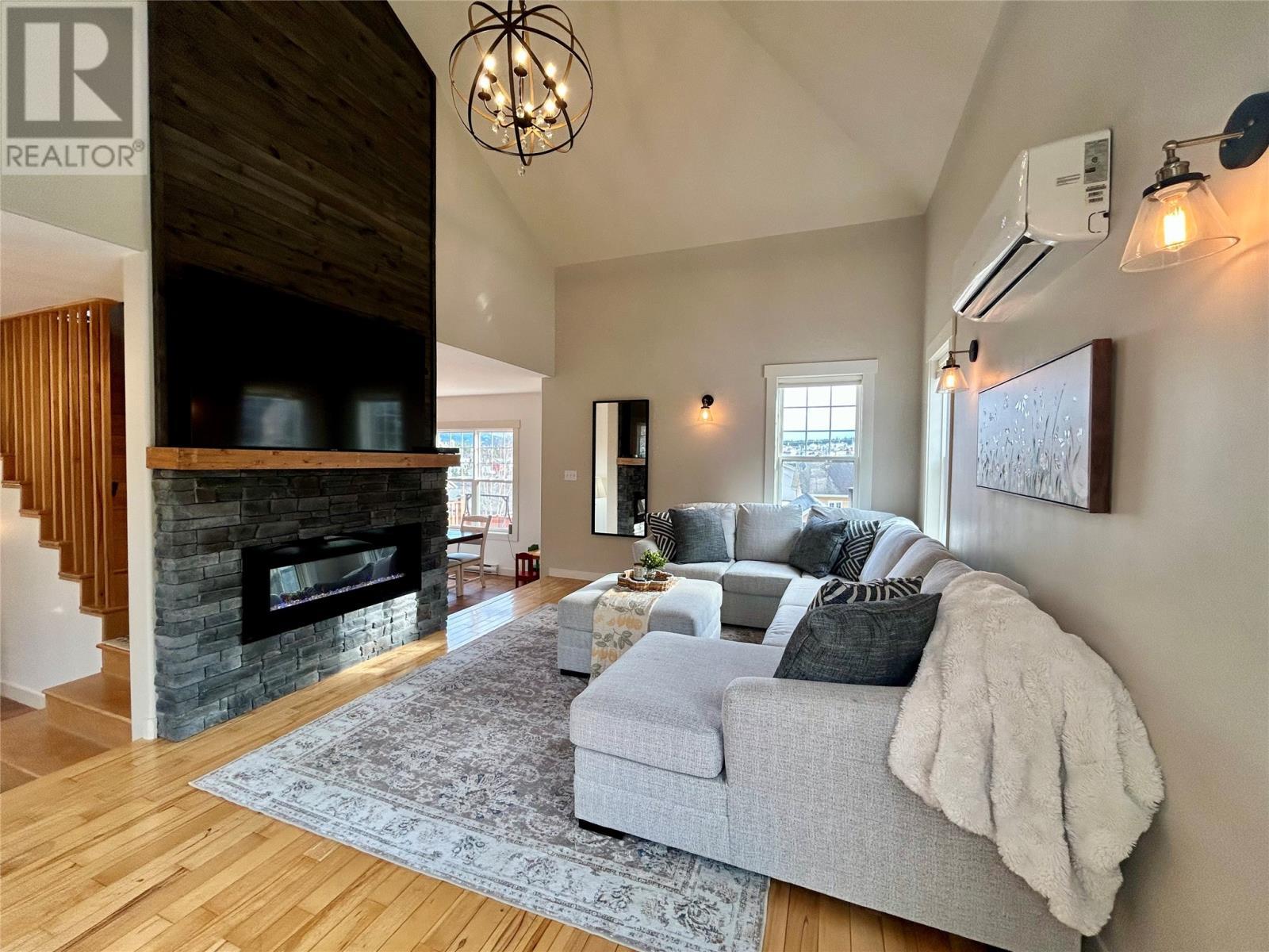 23 Hanlon Drive, Massey Drive, NL - Indoor Photo Showing Living Room With Fireplace