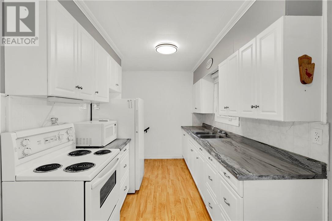 675 Brophy Street, Massey, ON - Indoor Photo Showing Kitchen With Double Sink