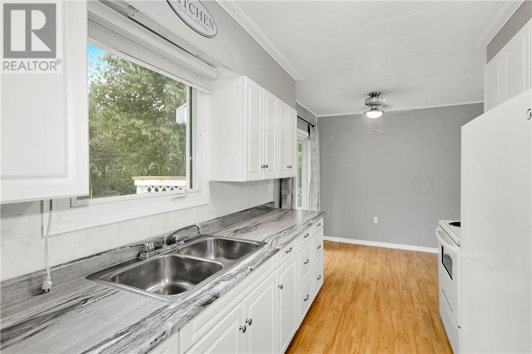 675 Brophy Street, Massey, ON - Indoor Photo Showing Kitchen With Double Sink