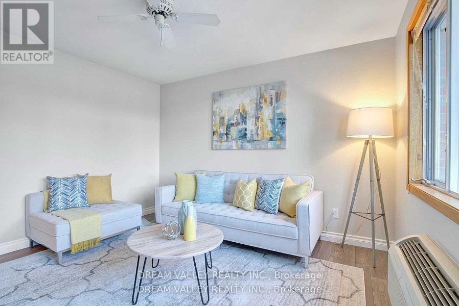 52 South Marine Drive, Toronto, ON - Indoor Photo Showing Living Room