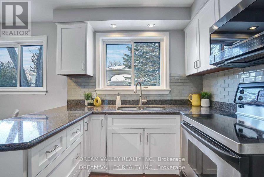 52 South Marine Drive, Toronto, ON - Indoor Photo Showing Kitchen With Double Sink