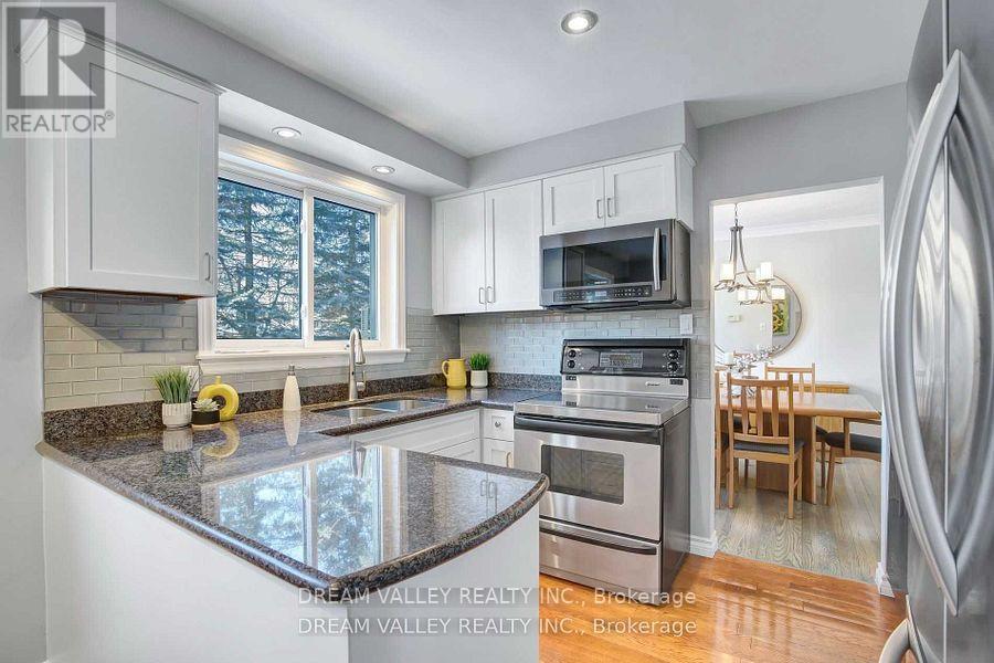 52 South Marine Drive, Toronto, ON - Indoor Photo Showing Kitchen With Double Sink