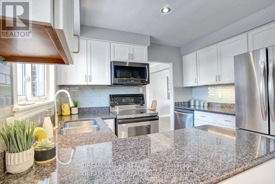 52 South Marine Drive, Toronto, ON - Indoor Photo Showing Kitchen With Double Sink With Upgraded Kitchen