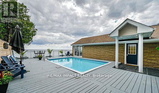 59 Cedar Crest Beach Road, Clarington, ON - Outdoor With In Ground Pool