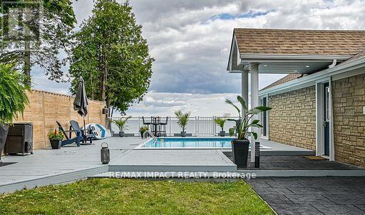 59 Cedar Crest Beach Road, Clarington, ON - Outdoor With In Ground Pool