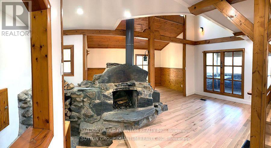 2724 River Road, Frontenac, ON - Indoor With Fireplace