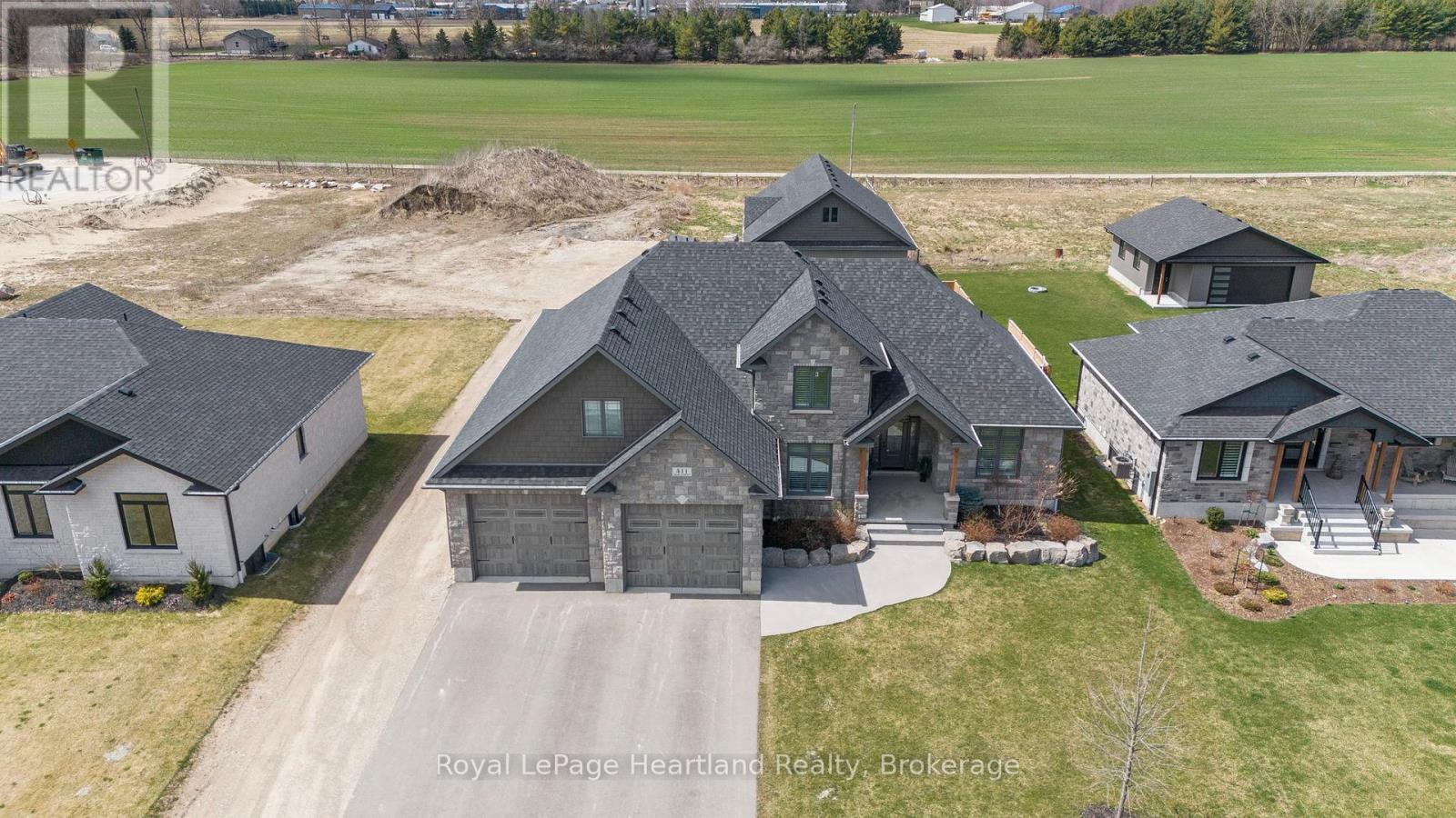 411 Jane Street, Minto, ON - Outdoor With Facade