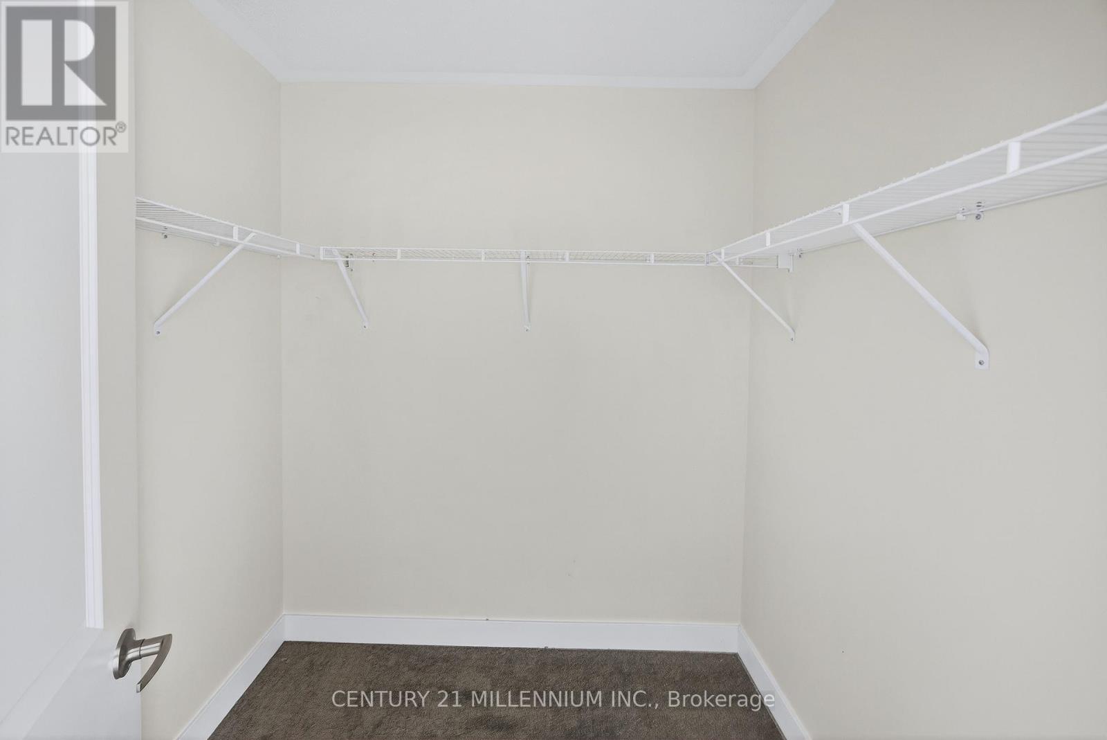 Primary bedroom walk-in closet - 100 Walden Drive, Shelburne, ON - Indoor With Storage