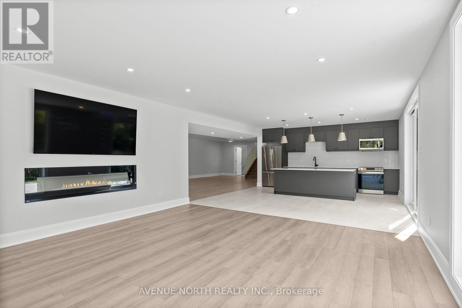 135 Cherryhill Drive, Ottawa, ON - Indoor Photo Showing Other Room With Fireplace