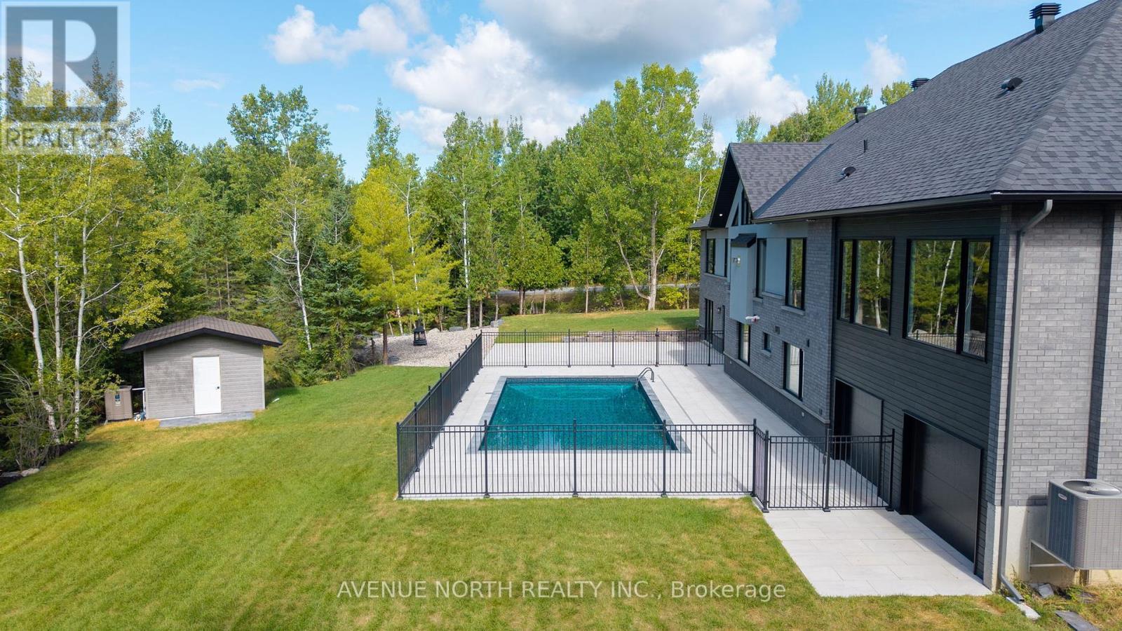 135 Cherryhill Drive, Ottawa, ON - Outdoor With In Ground Pool
