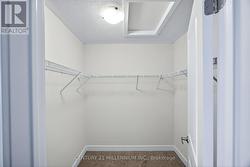 Primary walk-in closet -