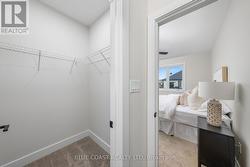 STAGED MODEL HOME - walk-in closet -