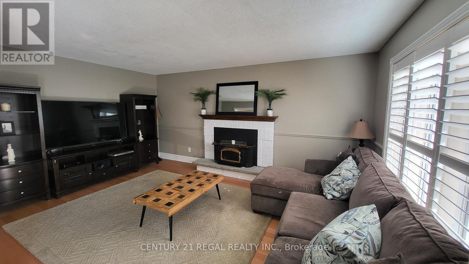 42 Milner Crescent, Ajax, ON - Indoor Photo Showing Living Room With Fireplace