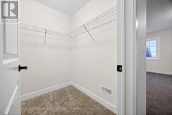 Primary Bedroom walk-in closet -