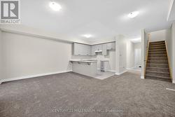 Open concept kitchen/dining/living rm. -