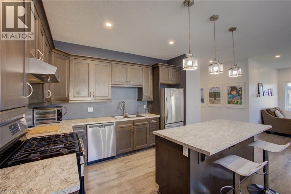 274 Mccourt Place, Atwood, ON - Indoor Photo Showing Kitchen With Double Sink