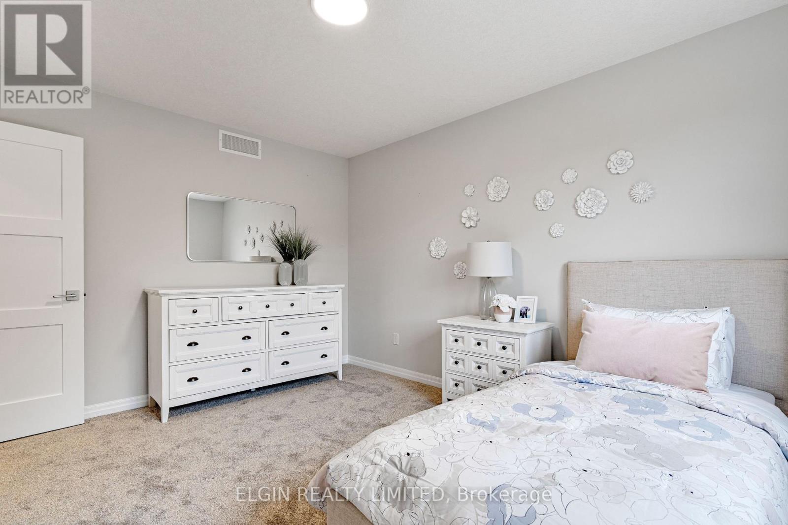 8 Columbus Court, Central Elgin, ON - Indoor Photo Showing Bedroom
