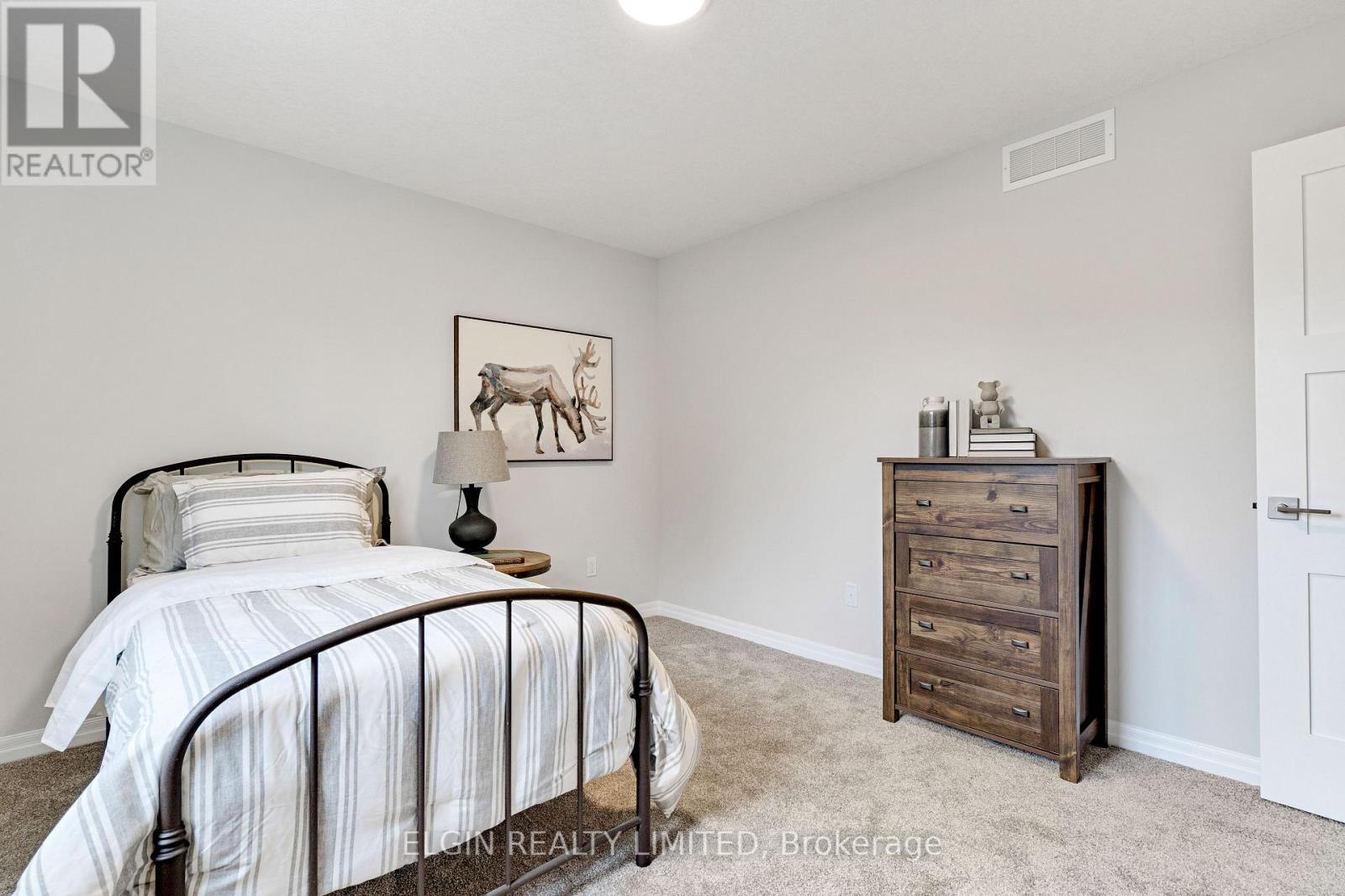 8 Columbus Court, Central Elgin, ON - Indoor Photo Showing Bedroom