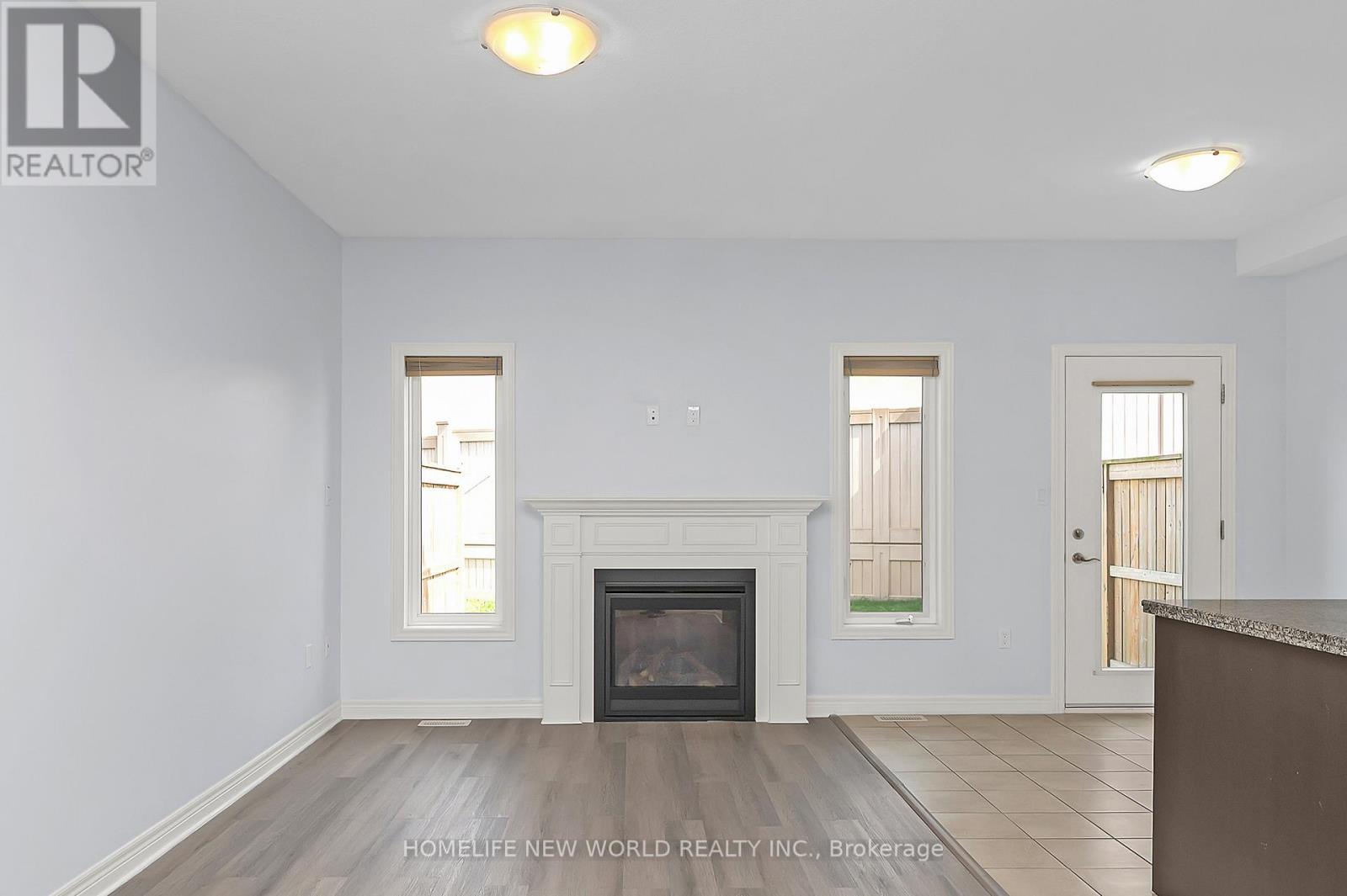 79 Sonoma Valley Crescent, Hamilton, ON - Indoor Photo Showing Living Room With Fireplace