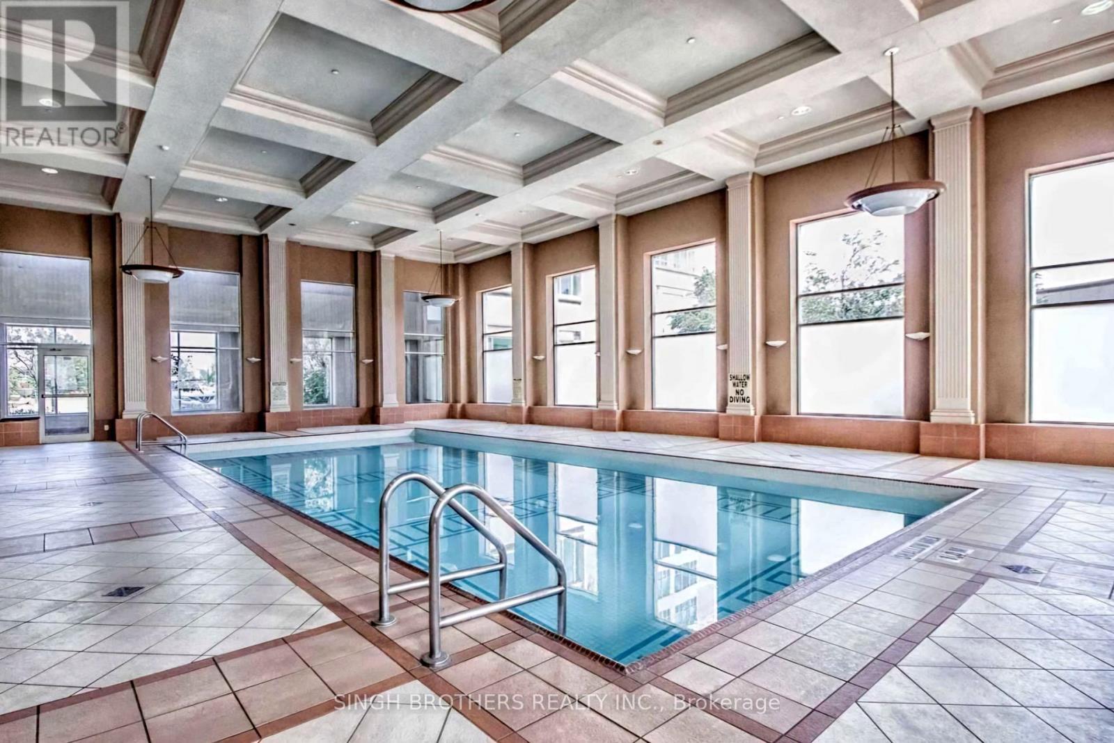 1505 - 1 Lee Centre Drive, Toronto, ON - Indoor Photo Showing Other Room With In Ground Pool