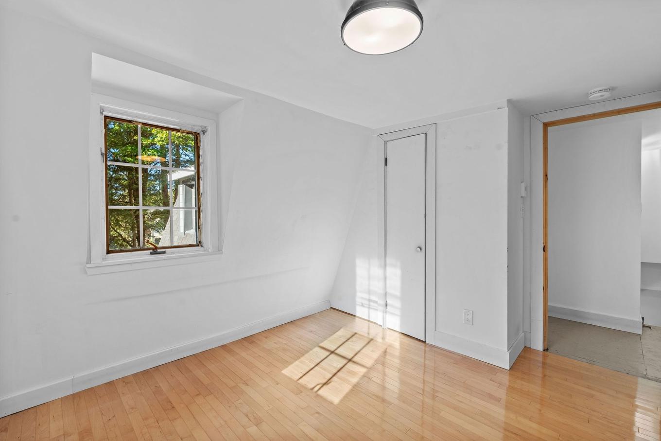 Chambre à coucher - 54 Av. Lafleur N., Saint-Sauveur, QC - Indoor Photo Showing Other Room