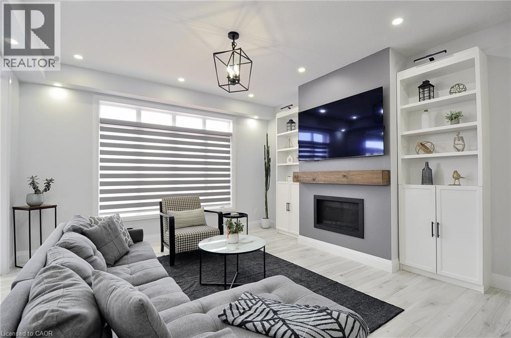 21 Gourlay Farm Lane, Ayr, ON - Indoor Photo Showing Living Room With Fireplace