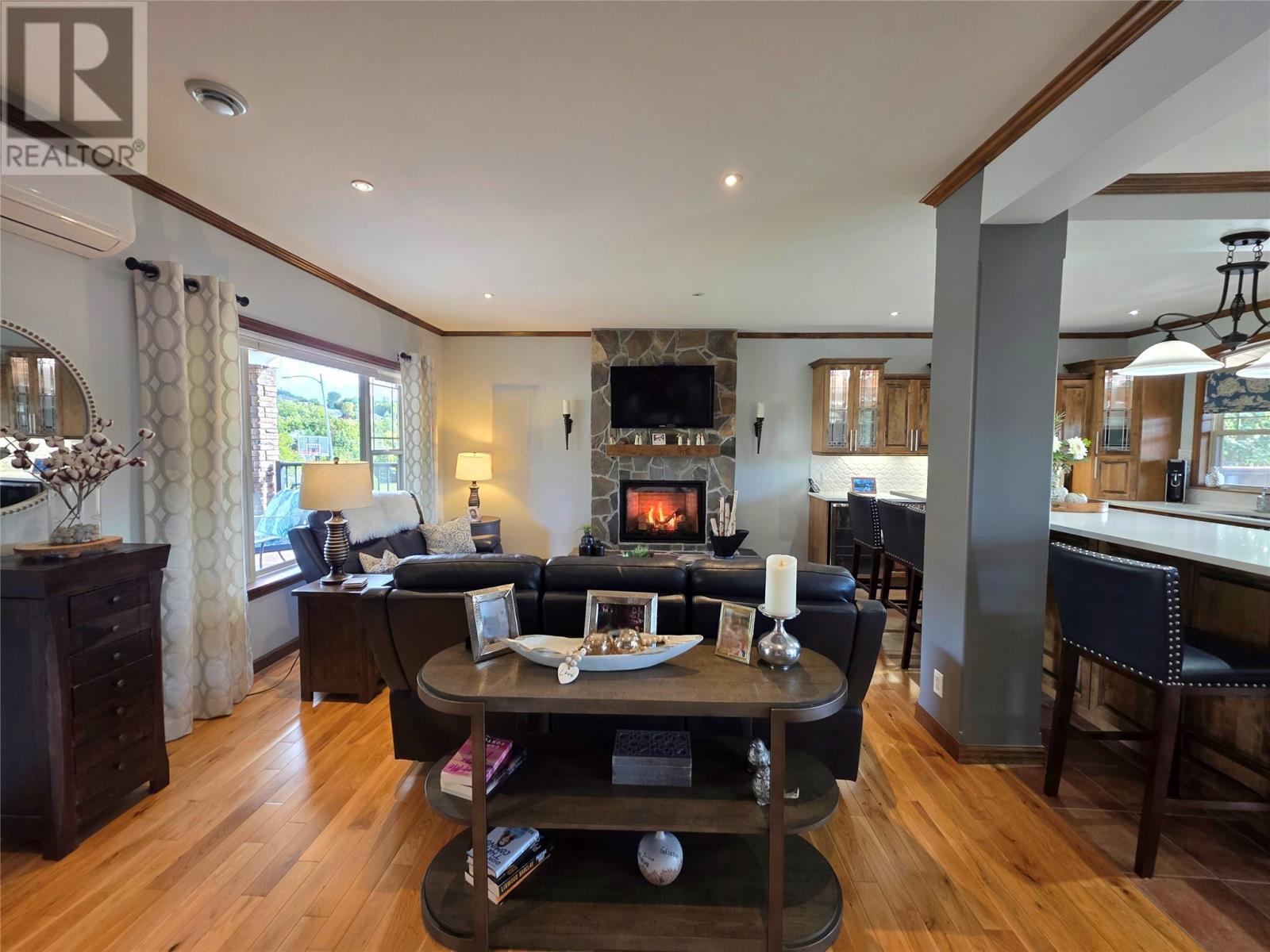 19 Raymond Heights, Corner Brook, NL - Indoor Photo Showing Dining Room With Fireplace