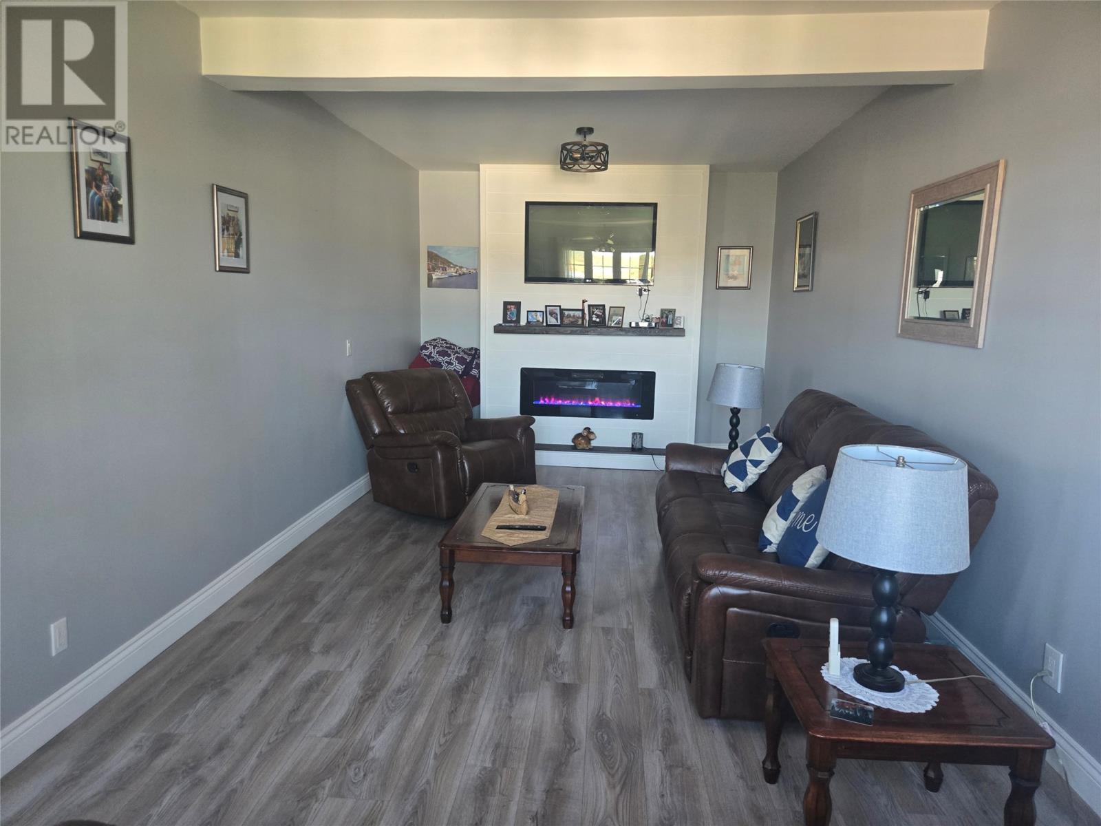 120 Water Street West Street, St. Lawrence, NL - Indoor Photo Showing Other Room With Fireplace