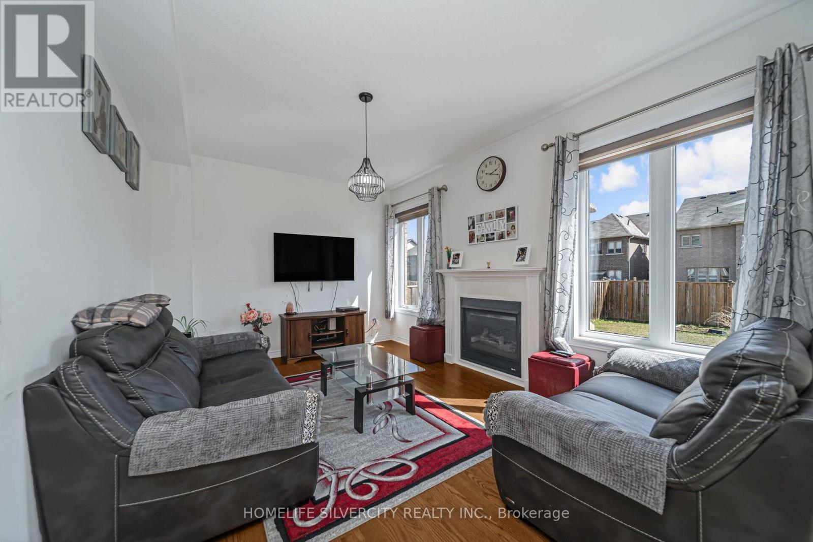 366 Porter Drive, Woodstock, ON - Indoor Photo Showing Living Room With Fireplace