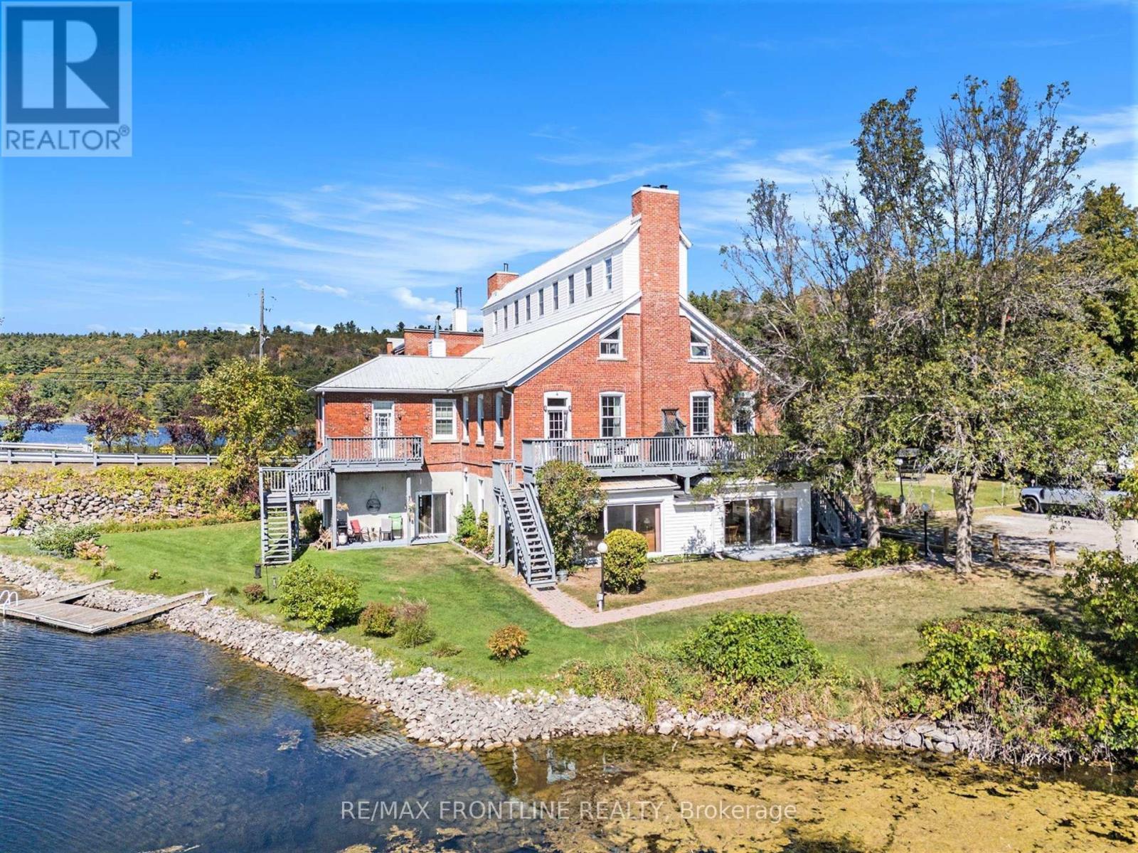 1 - 19 Main Street, Westport, ON - Outdoor With Body Of Water With Deck Patio Veranda