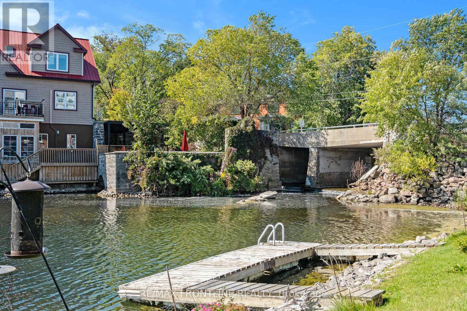 1 - 19 Main Street, Westport, ON - Outdoor With Body Of Water With Deck Patio Veranda