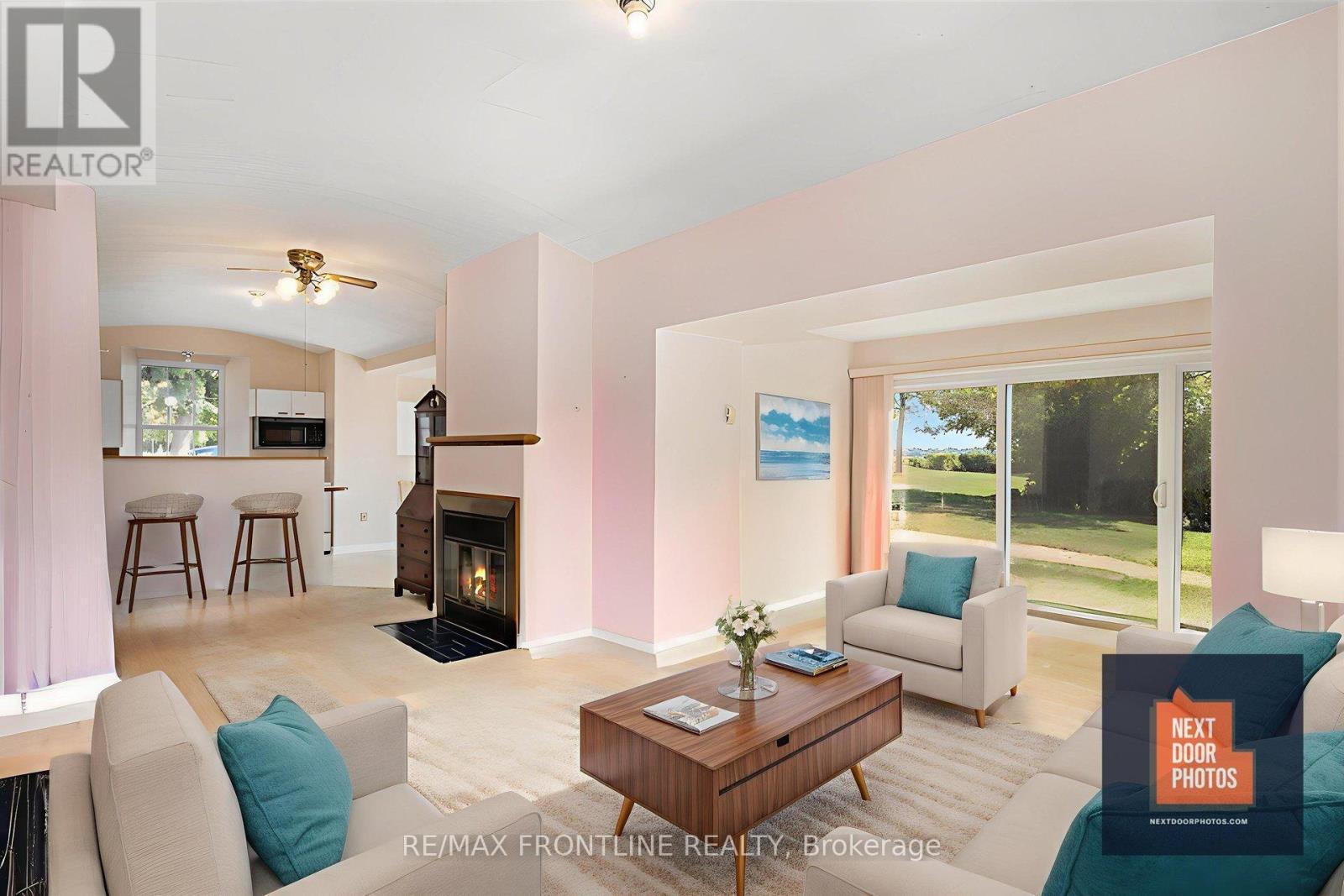 1 - 19 Main Street, Westport, ON - Indoor Photo Showing Living Room With Fireplace