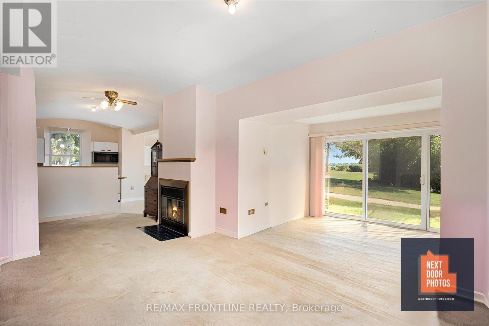 1 - 19 Main Street, Westport, ON - Indoor With Fireplace