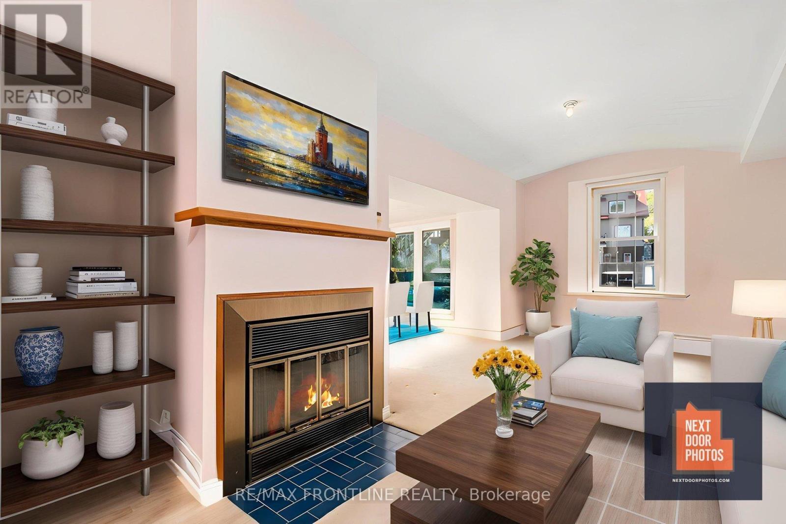 1 - 19 Main Street, Westport, ON - Indoor Photo Showing Living Room With Fireplace
