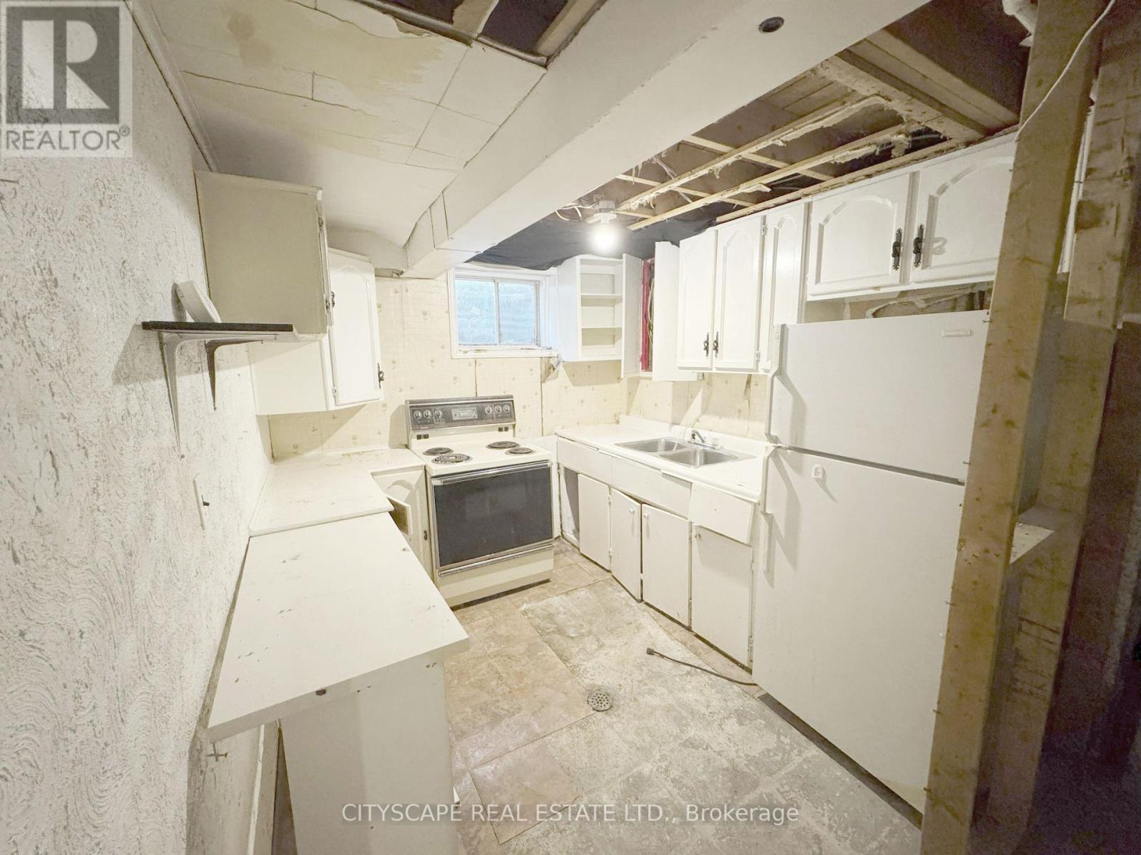 Basement: Kitchen - 2368 Gareth Road, Mississauga, ON - Indoor Photo Showing Kitchen With Double Sink