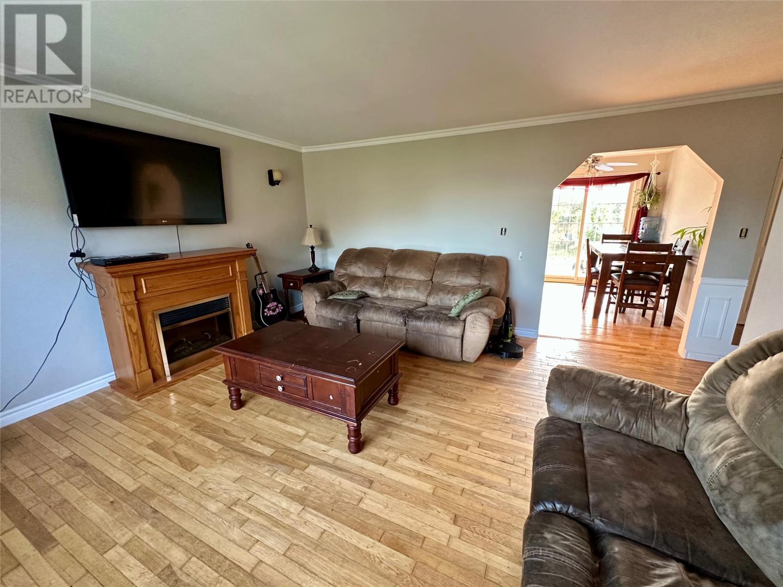 274 Main Road, Lark Harbour, NL - Indoor Photo Showing Living Room With Fireplace