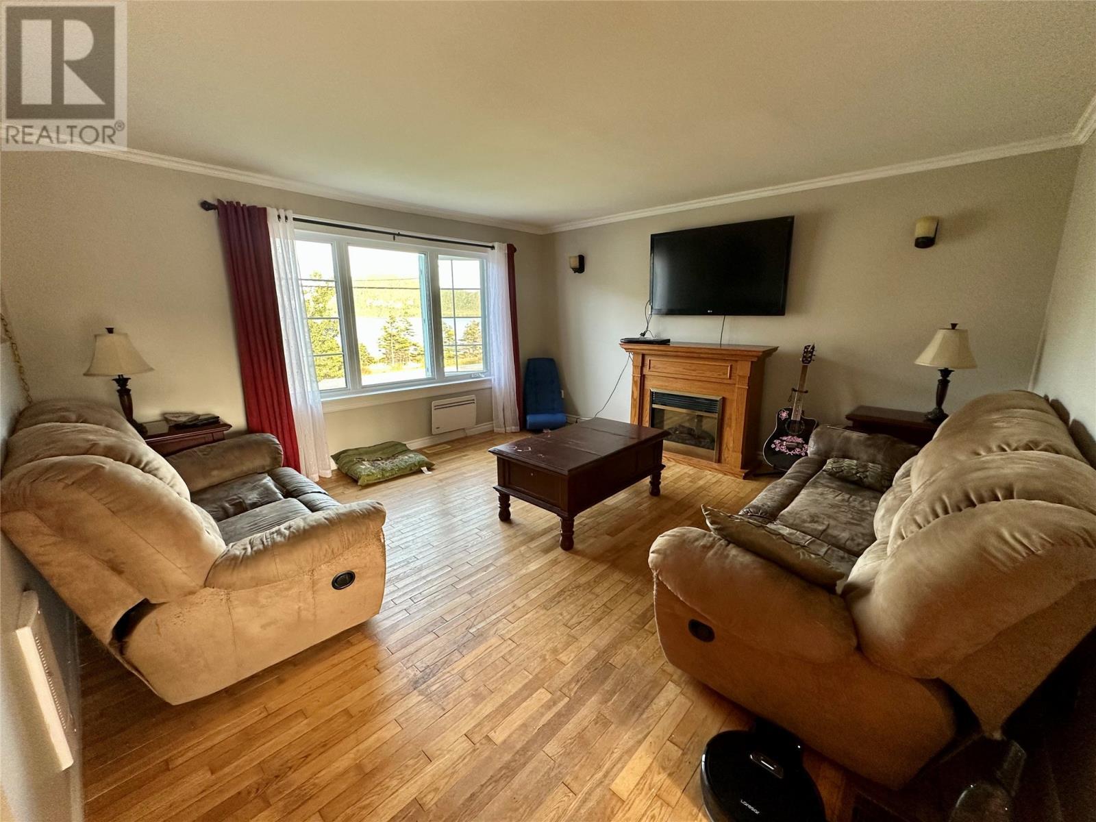 274 Main Road, Lark Harbour, NL - Indoor Photo Showing Living Room With Fireplace