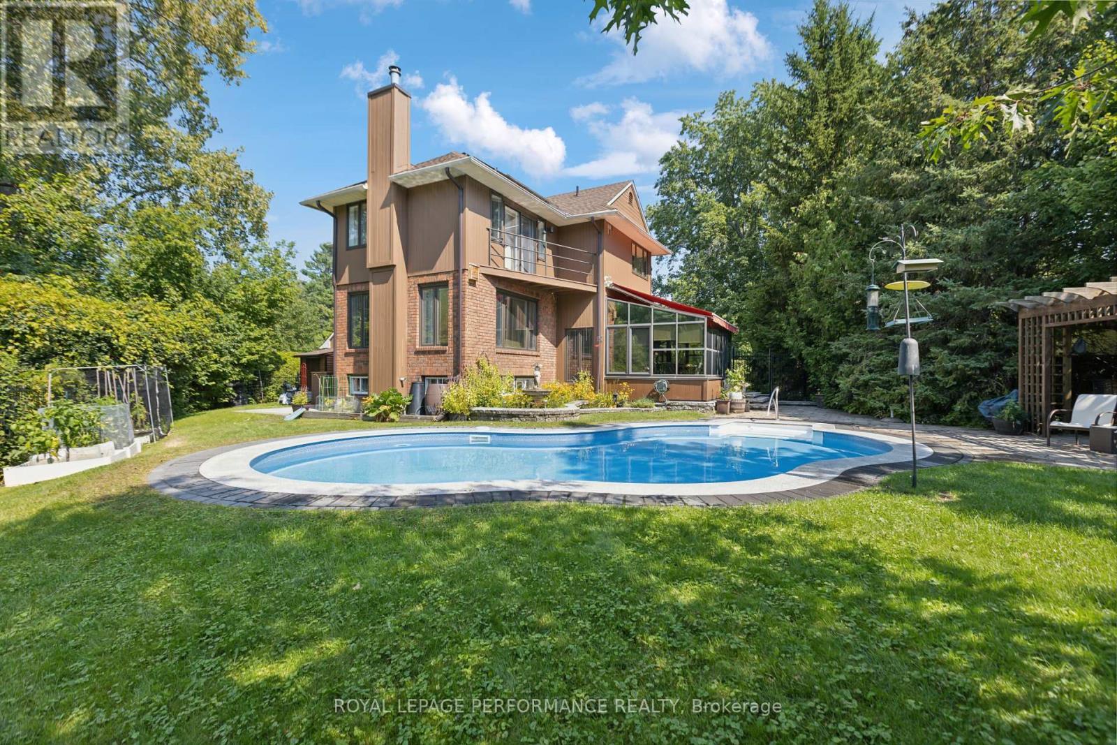 55 Delong Drive, Ottawa, ON - Outdoor With In Ground Pool With Backyard