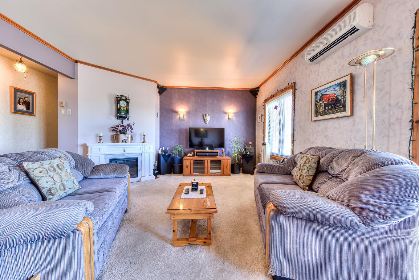 Salon - 8-4948 Boul. Notre-Dame, Laval (Chomedey), QC - Indoor Photo Showing Living Room With Fireplace