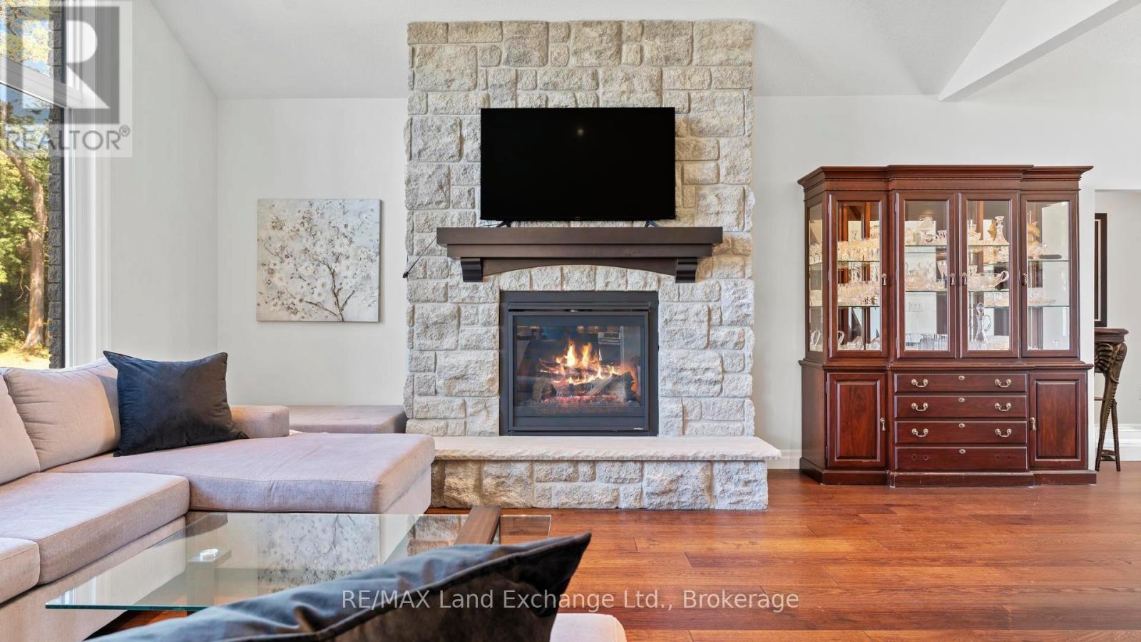 939 Bogdanovic Way, Huron-Kinloss, ON - Indoor Photo Showing Living Room With Fireplace