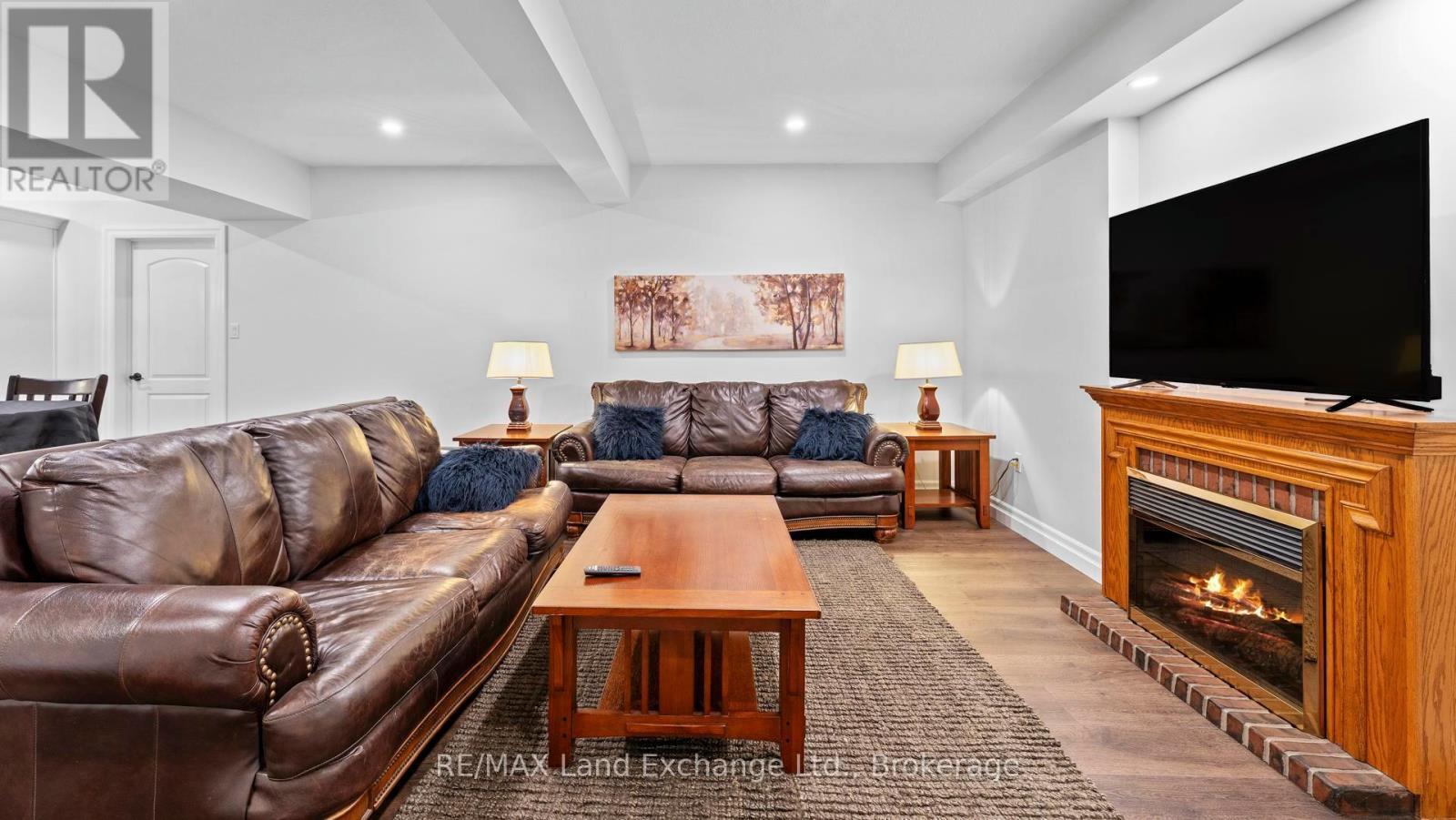 939 Bogdanovic Way, Huron-Kinloss, ON - Indoor Photo Showing Living Room With Fireplace