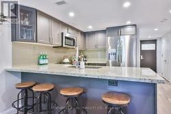 Breakfast bar with quartz counters! -