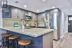Stainless steel appliances & quartz counters. -