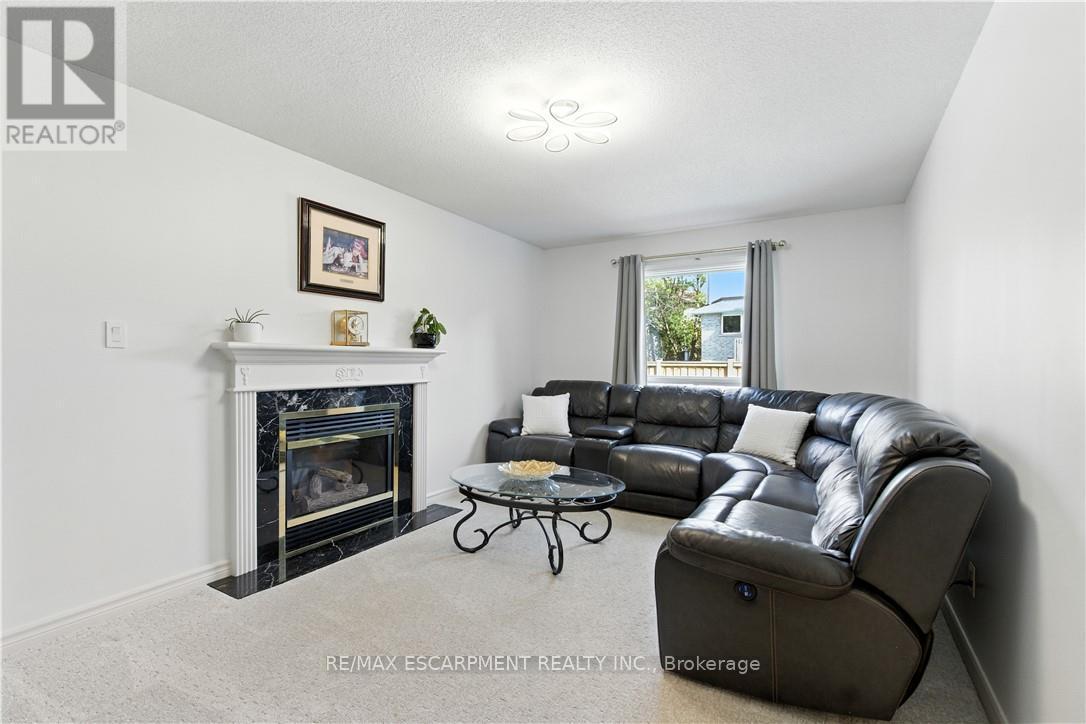 10 Shadowdale Drive, Hamilton, ON - Indoor Photo Showing Living Room With Fireplace