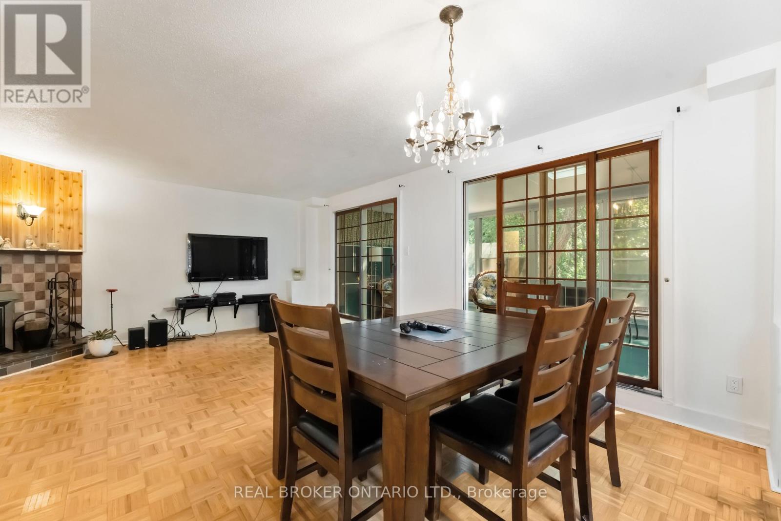 77 Priam Way, Ottawa, ON - Indoor Photo Showing Dining Room With Fireplace