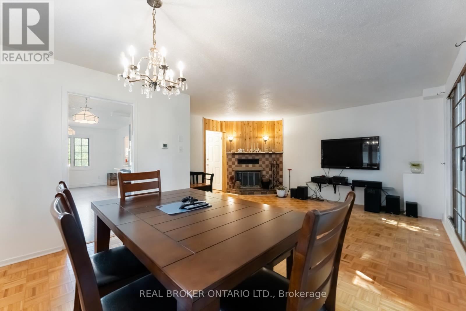 77 Priam Way, Ottawa, ON - Indoor Photo Showing Dining Room With Fireplace