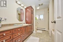 Main Level 4-PC Bath, Separate Shower, and Tub -