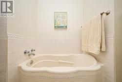 Large soaker tub in the main level bathroom -