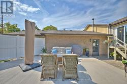 View of the back of the house with separate ent. -